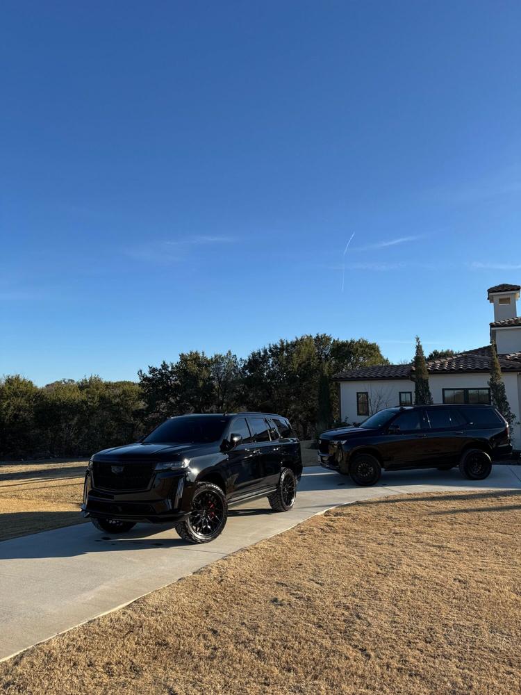 Luxury SUVs detailed on site